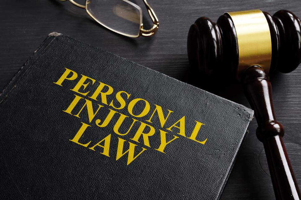 personal injury notebook next to gavel