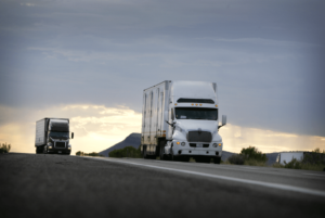 semi trucks driving on the road